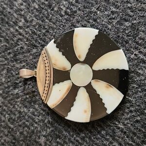 Ivory, silver and mother of pearl pendant